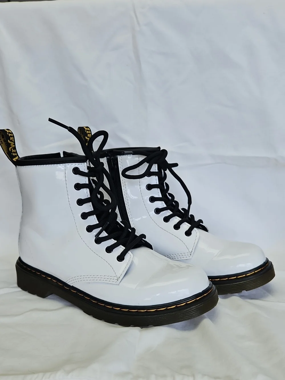 Dr. Martens White Patent Lace-Up Boots with Black Laces